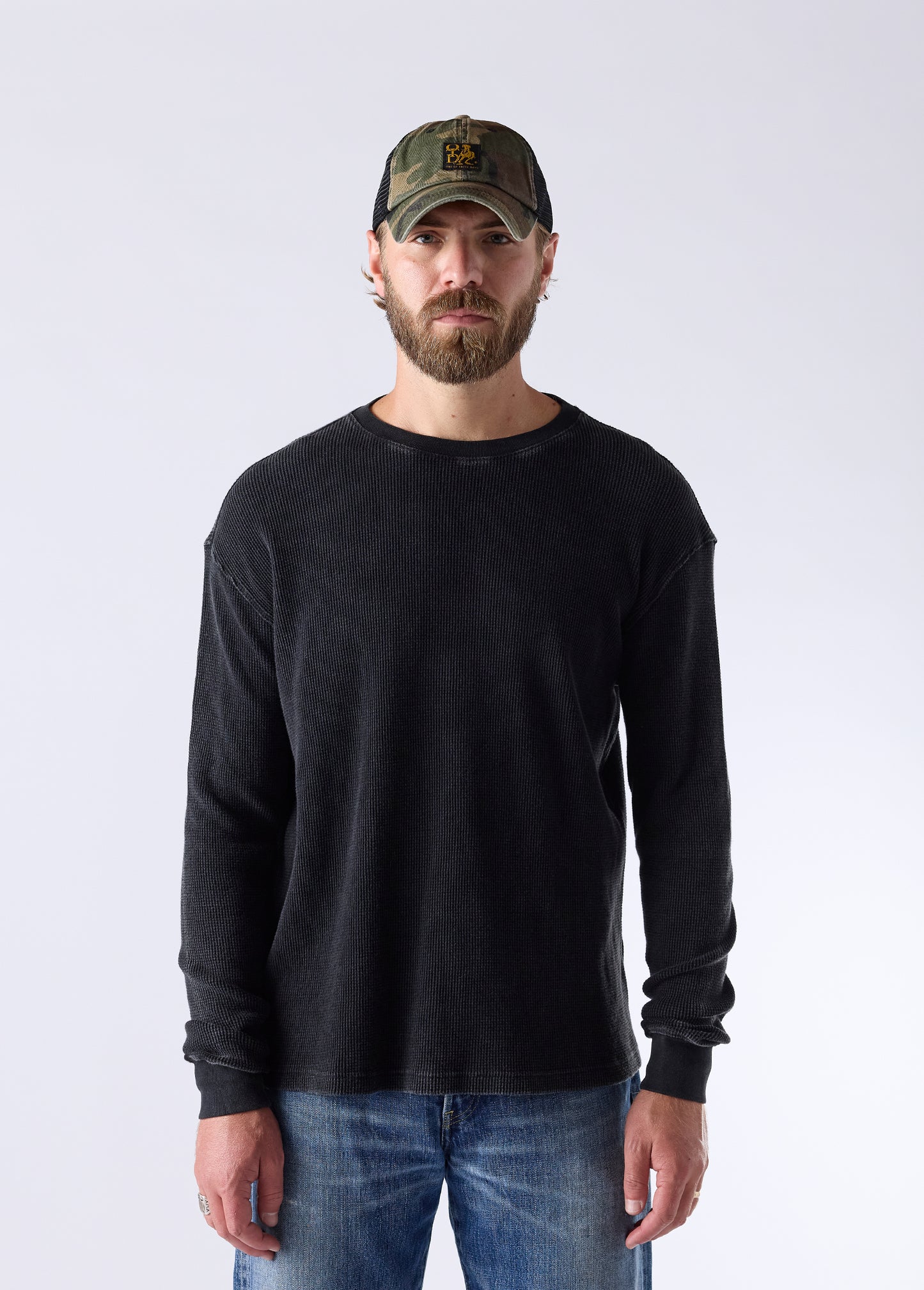 Woven Label Trucker Hat | Woodland Camo