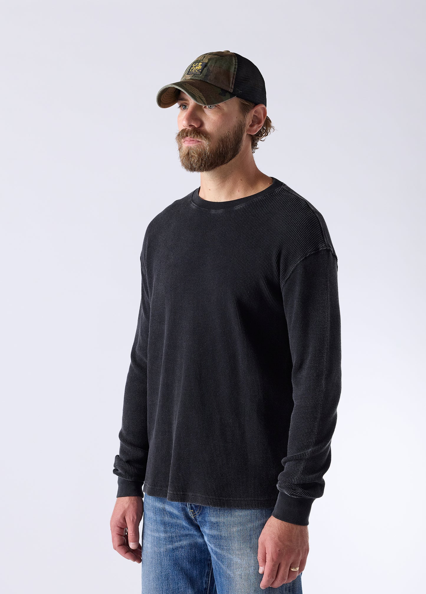 Woven Label Trucker Hat | Woodland Camo