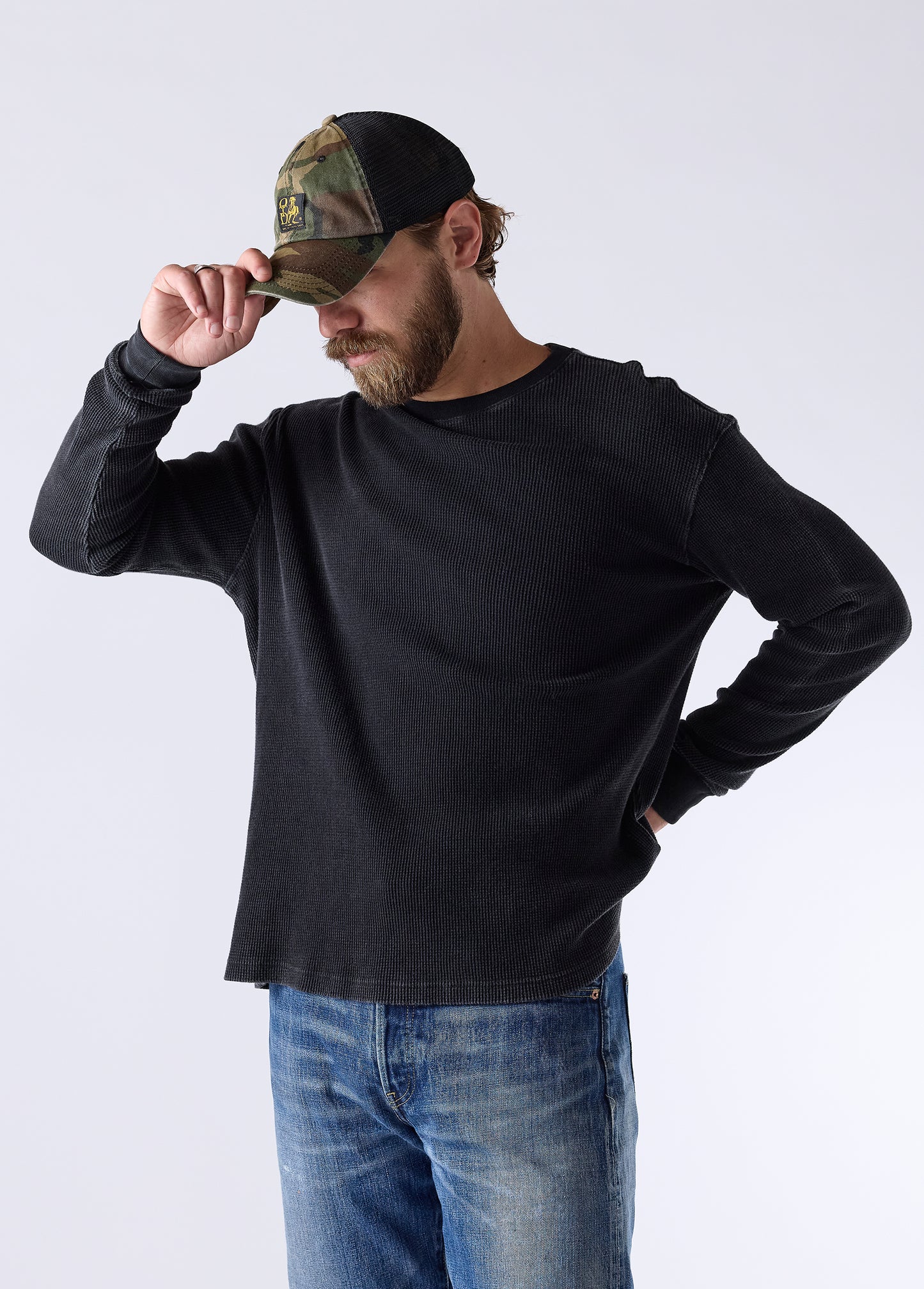 Woven Label Trucker Hat | Woodland Camo